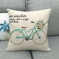 Detailed close-up of watercolor bicycle and floral print on a linen throw pillow cover. - 18x18 Inch / Teal Bicycle with Watercolor Flowers (12)
