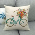 Linen pillow cover with watercolor bicycle and floral print on a gray fabric sofa - 18x18 Inch / Cyan Bicycle with Hand-painted Flowers (13)