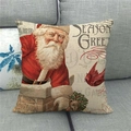 Dettaglio della federa in lino vintage con Babbo Natale e scritta Season Greetings - Babbo Natale del Camino / 45x45cm