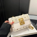 White minimalist crossbody bag with bear print, diamond pattern and gold chain strap - White
