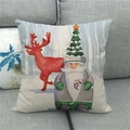 Detail of Christmas pillow cover with reindeer and santa on a gray sofa scene - 18x18 Inch / Red Reindeer and Character Style (7)