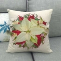 Close-up of linen pillowcase texture showing vibrant watercolor red poinsettia pattern - Poinsettia Floral (1)