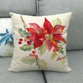 Macro detail of watercolor poinsettia floral print on linen textured cushion cover - Christmas Red Berries (4)