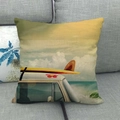 Linen cushion cover with vintage summer beach van print shown on a gray sofa setup - 18x18 Inch / Retro Seaside Van Yellow Sky Style (10)
