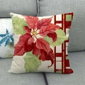 Detail of Christmas poinsettia flower linen pillowcase on a grey sofa with fabric texture - Vintage Flower Stripes (16)