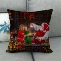 Close-up of vintage Christmas linen pillowcase with Santa and nutcracker on gray sofa - Santa With Child Retro (12) / 18x18 Inch