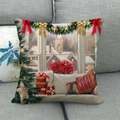 Detailed Christmas linen pillowcase showing oil painting style holiday window on a sofa - 45x45cm / Christmas Window Poinsettia (2)