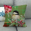 Detail of Christmas sparrow and red poinsettia print on linen pillowcase with plaid base - Dark Green Plaid Chickadee (8)