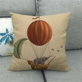 Detailed texture of linen pillowcase featuring elephant balloon illustration on sofa - Elephant In Wood Boat With Hot Air Balloon (4) / 18x18 Inch