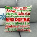 Christmas linen pillowcase with red and green holiday text on a grey fabric sofa - Cream Background Full Red and Green Christmas Words (12) / 18x18 Inch