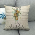Close-up of linen Christmas pillow case with bell design and Jingle text on a sofa - 18x18 Inch