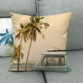 Linen cushion cover with retro summer beach van and palm trees on a gray sofa - Vintage Van Surfboard Style (2)