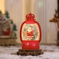 Primer plano de linterna de Navidad roja vintage con Papá Noel y efecto de brillo LED - Rojo (Papá Noel con saco)