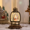 Detalle de linterna navideña vintage con escena de Papá Noel sobre base de madera - Oro Envejecido (Papá Noel)