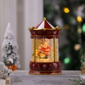 Dettaglio lanterna carosello natalizio musicale con effetto neve e Babbo Natale all'interno - Cabina Telefonica Rossa Babbo Natale