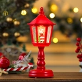 Detailed view of a red musical Christmas lantern lamp with Santa Claus and glitter - Santa Claus (Red)