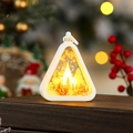 Macro detail of a white Christmas lantern featuring a cutout silhouette of Santa Claus and deer - White Reindeer Sleigh