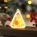 Detail of Christmas lantern featuring Santa Claus painting and warm LED glow decor - White Santa with Bag