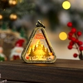 Detail of warm LED Christmas lantern with Merry Christmas print and festive bokeh background - Brushed Gold Christmas Tree