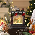 Dettaglio di un carillon natalizio a camino vintage con Babbo Natale e neve glitter - Stile Slitta con Renne