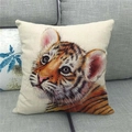 Linen decorative pillow cover featuring a realistic tiger face print on a grey sofa - Realistic Tiger Cub Expression (7)
