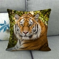 Detailed close-up of tiger print linen pillowcase on a grey textured sofa - Orange Brown Tiger (8)