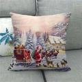 Detail of vintage Christmas Santa Claus linen pillowcase on a grey sofa - Vintage Santa And Reindeer Style (5)