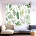 Detail of green monstera leaves printed on a peach skin wall tapestry in a modern living room - Mixed Green Leaves (5)