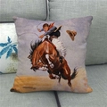 Detail of linen pillowcase featuring a vintage cowboy riding a horse on a grey sofa - 18x18 Inch / Cowboy Riding (10)
