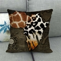 Close-up of linen cushion cover with Africa map and animal prints on a grey sofa - 18x18 Inch / Africa Map (14)