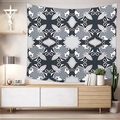 Macro detail of Bohemian peach skin tapestry with grey floral patterns in a modern living room - Pattern Ten