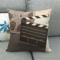 Detail of clapperboard design on linen pillowcase featuring director and scene text - Dark Brown Movie Terms Style (3)