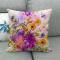 Kissenbezug aus Leinen mit bunten Aquarell-Wildblumen auf einem grauen Sofa - Aquarell Wildblumen Design (4)
