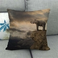 Detail of linen cushion cover featuring a realistic elephant standing by a cliff edge - Elephant on Cliff with Cloud Sea (8)