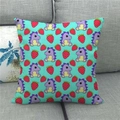 Green linen pillow cover with purple cartoon dinosaurs and red strawberry print on sofa - 45x45cm / Teal Purple Dinosaur Strawberry