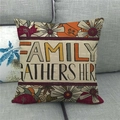 Close-up of linen pillow cover with floral wreath and 'Family Gathers Here' text - FAMILY GATHERS HERE Vintage Maple