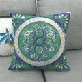 Detail showing the linen texture and mandala floral print on the square cushion cover - Blue Green Vintage Floral Style