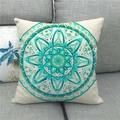 Detail of teal mandala pattern and linen texture on a bohemian square throw pillow cover - Teal Gold Mandala Style