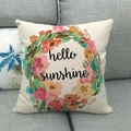 Linen blend throw pillow cover with floral wreath and hello sunshine print on a sofa - Watercolor Floral Wreath Style (11)