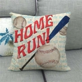 Detail of linen baseball pillowcase with Home Run text on a gray fabric sofa - HOME RUN Baseball Sports Theme