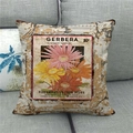Close-up of vintage flower linen pillowcase with retro seed store print on gray sofa - 18x18 Inch / Vintage Gerbera (5)
