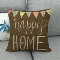 Close-up of linen pillowcase with happy HOME print and heart detail on sofa - 18x18 Inch / Happy Home Heart Bunting Style