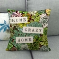 Detail of linen cushion cover with succulents and Home Crazy Home text on sofa - 18x18 Inch / HOME CRAZY HOME Succulent Pattern Style