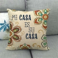 Linen cushion cover with mandala floral pattern and Mi Casa Es Su Casa text on a grey sofa - 18x18 Inch / Mi Casa es Su Casa Mandala Floral Style