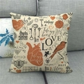 Macro shot of vintage style linen pillowcase with heart and angel prints on a grey sofa - Vintage Illustration Hand-drawn Angel Style (9)