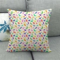 Linen square pillowcase with colorful dinosaur silhouettes on a grey sofa - 45x45cm / Beige Colorful Dinosaur Silhouette