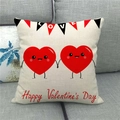 Close-up of linen Valentine's Day pillow cover with heart design on a gray fabric sofa - 18x18 Inch / Hearts Bunting Holiday Style (7)