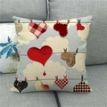 Linen pillowcase detail showing hearts on clothesline against a blue cloud background - Hanging Hearts Style (1)