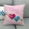 Detail of Happy Valentine's Day linen pillowcase with heart prints on a gray sofa - Double Heart Arrow Style (3)