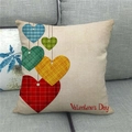 Close-up of linen pillowcase with colorful plaid hearts and Valentine's Day text - Plaid Heart Ornaments Style (7)
